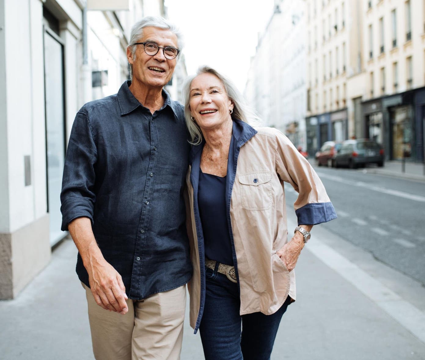 canva-happy-couple-retirement-walking-street