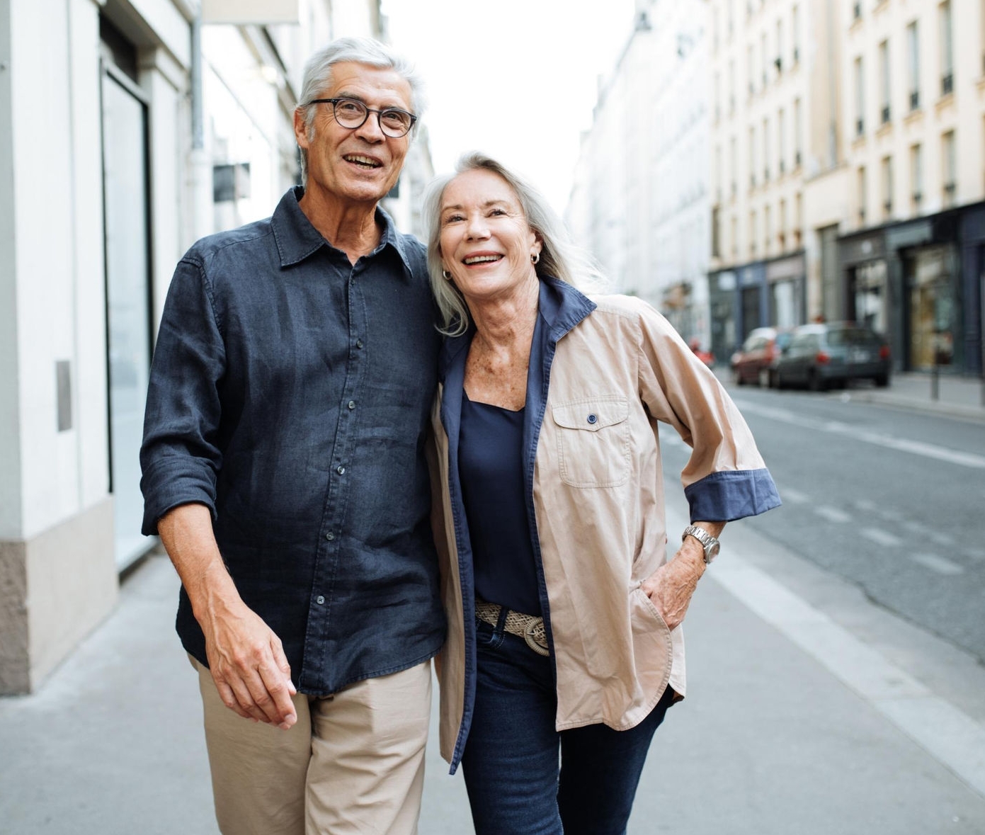 canva-happy-couple-retirement-walking-street