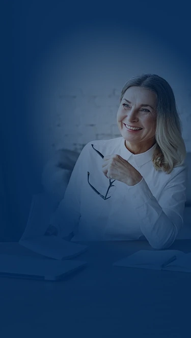 Woman holding glasses and smiling - tablet