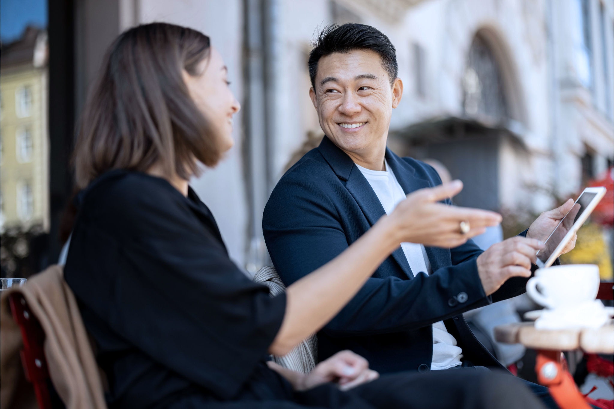 Canva-colleagues-talking-over-coffee-6000x4000