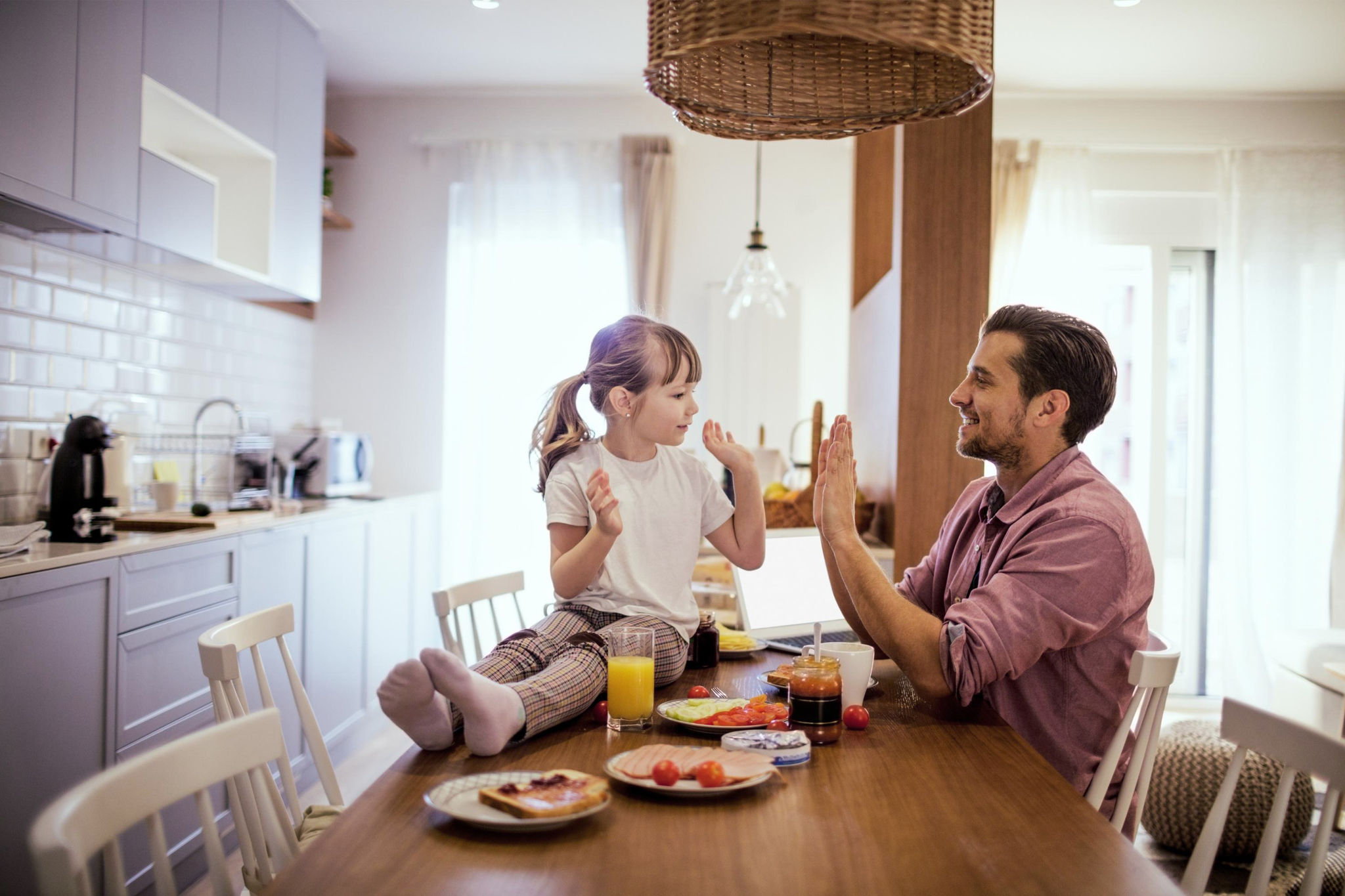 canva-father-daughter-kitchen-playing