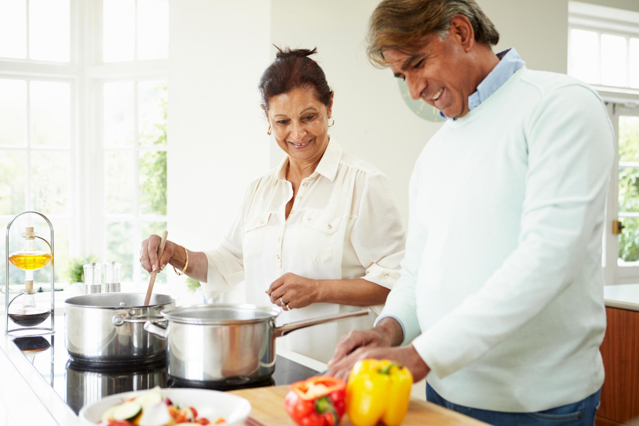 Couple cooking dinner together