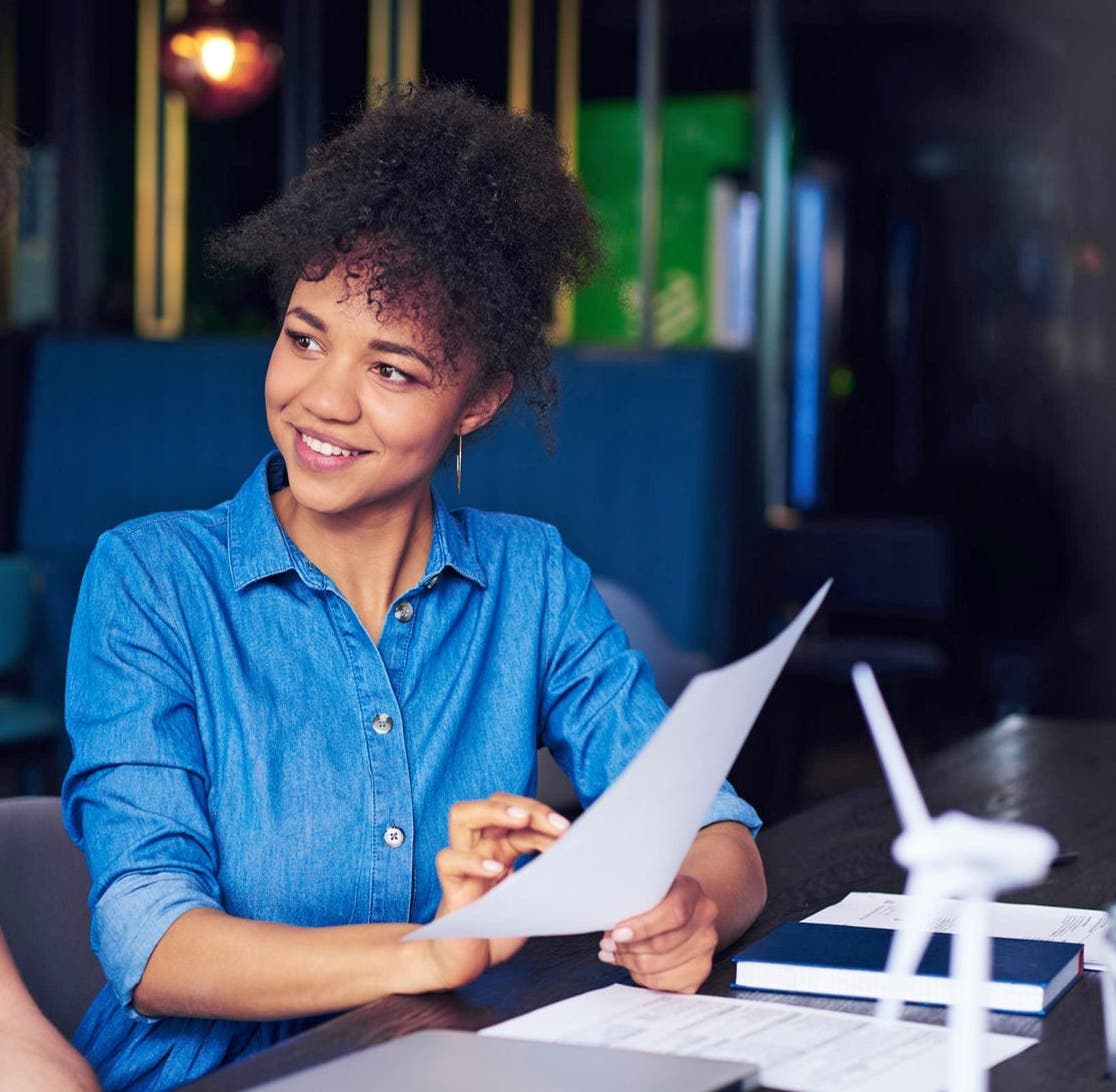 canva-male-female-diverse-colleagues-chatting-work