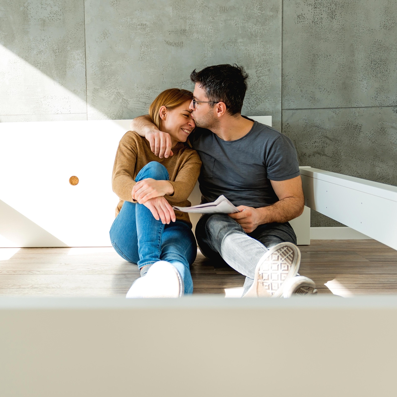 canva-young-couple-new-home