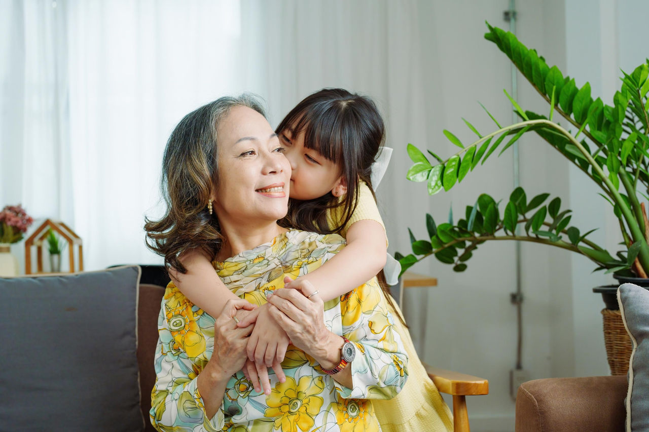 canva-senior-grandmother-grand-daughter-asian